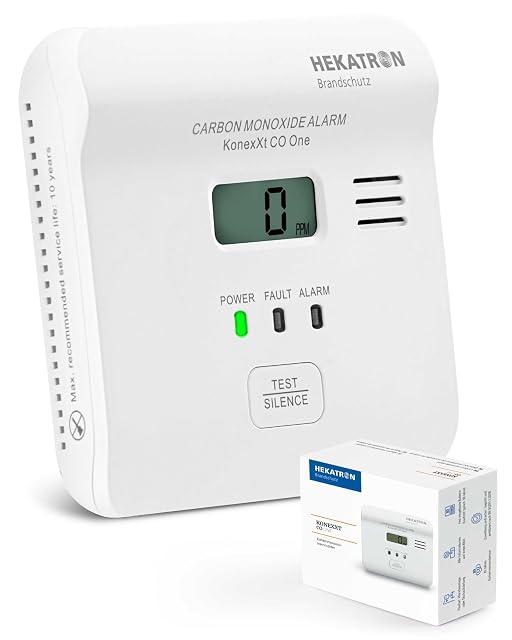 Detector de monóxido de carbono Hekatron KonexXt CO One blanco con pantalla, montado plano sobre una pared